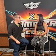 Roxanne Perez standing victorious in the WWE ring