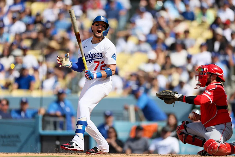 Dodgers and Angels in action, capturing the decisive series moment.