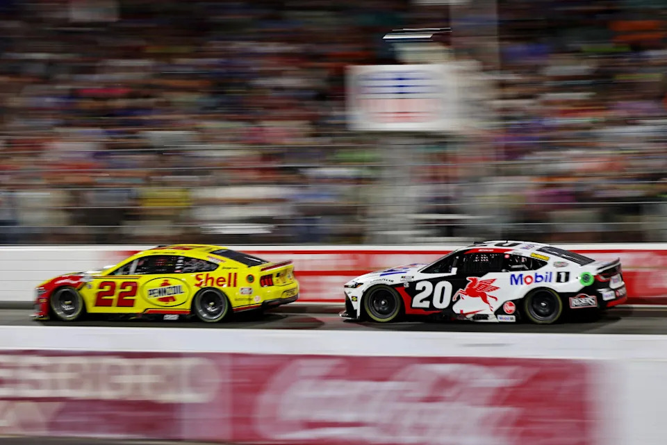 Christopher Bell celebrates in Victory Lane after winning the 2025 All-Star Race at North Wilkesboro, exemplifying recent NASCAR results.