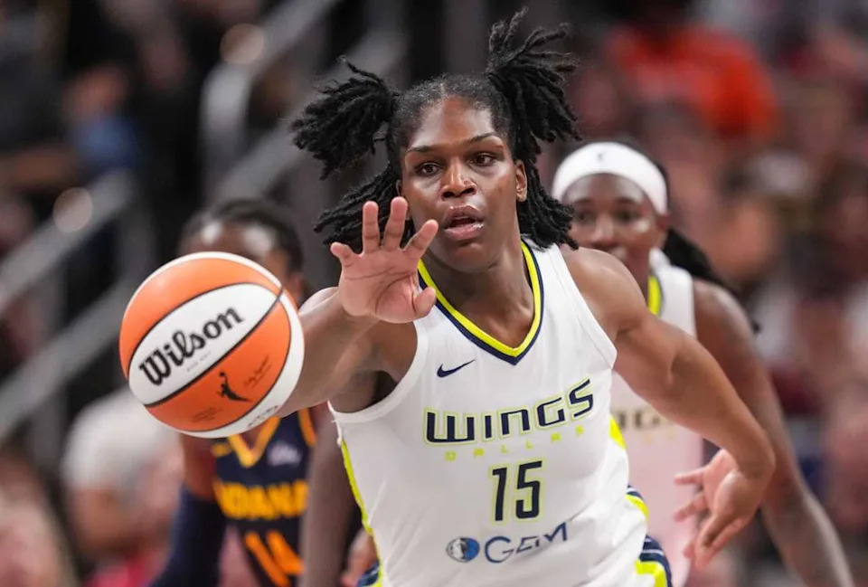 Teaira McCowan leaving the court during a Dallas Wings game